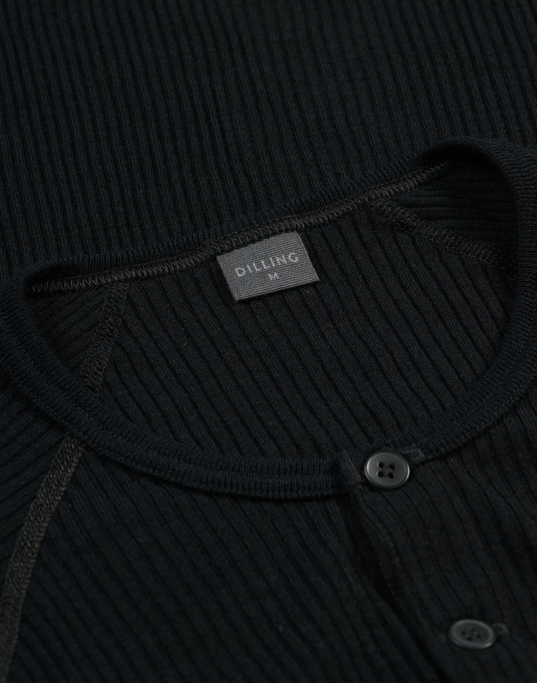 Bluse med knapper i merinould til mænd