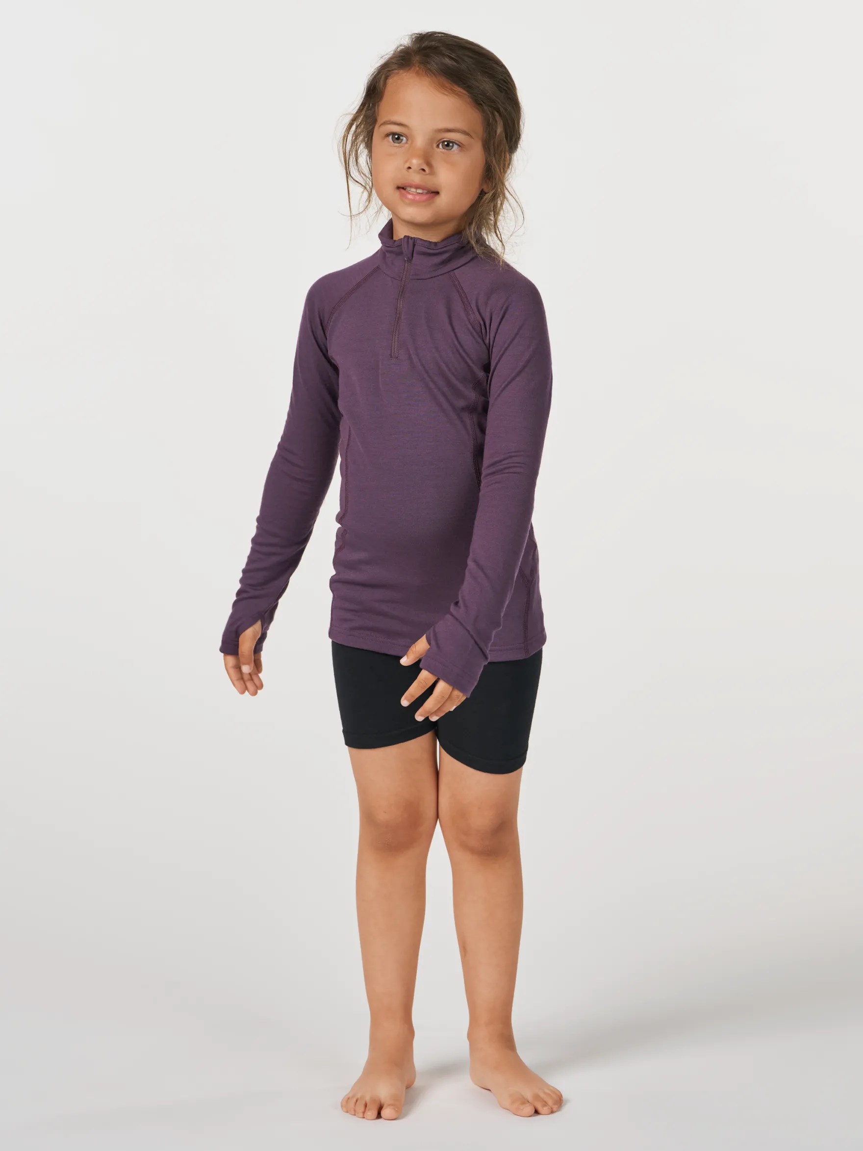 Half-zip bluse i merinould til børn