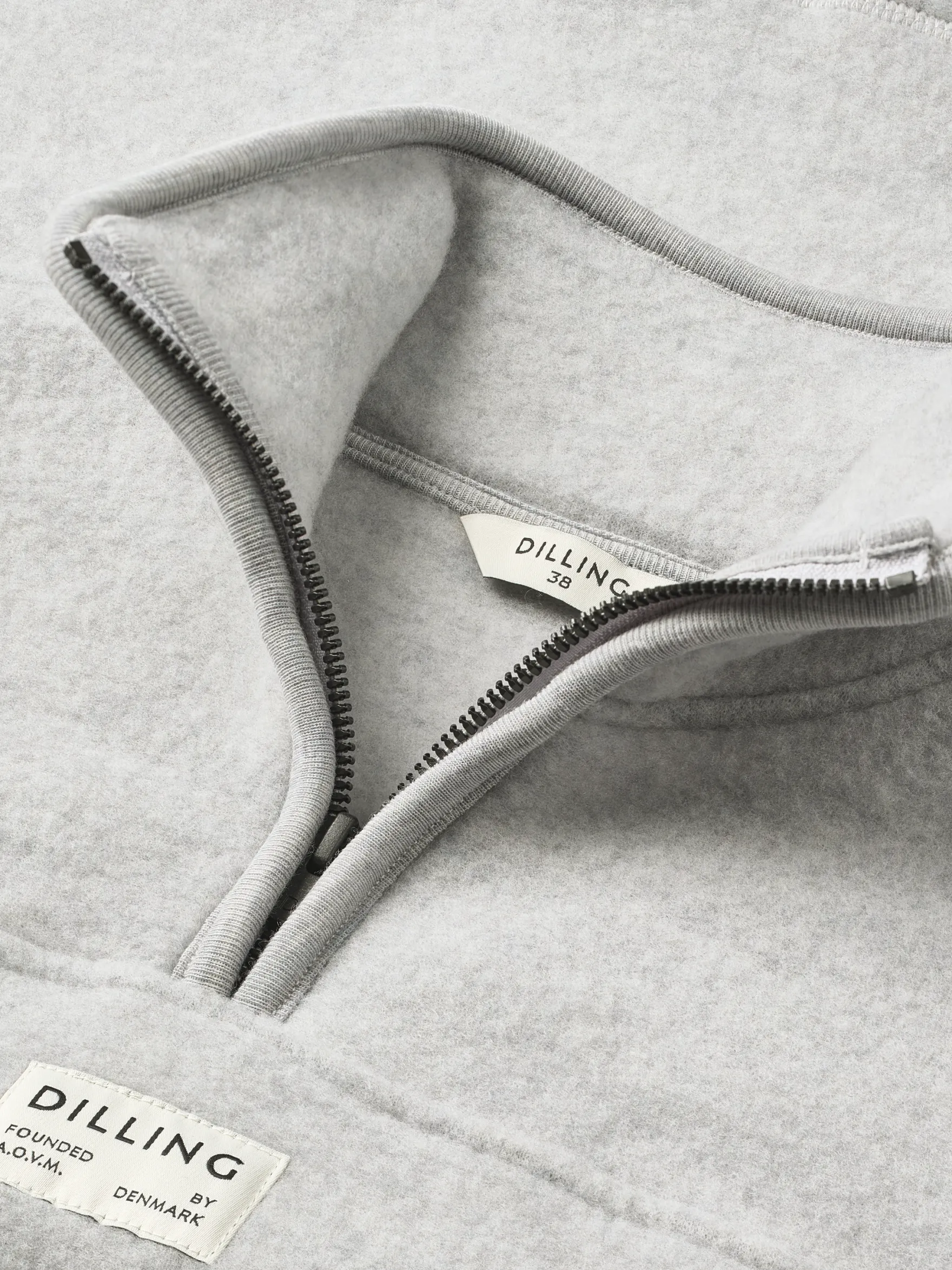 Half-zip-jakke i merinouldfleece til kvinder