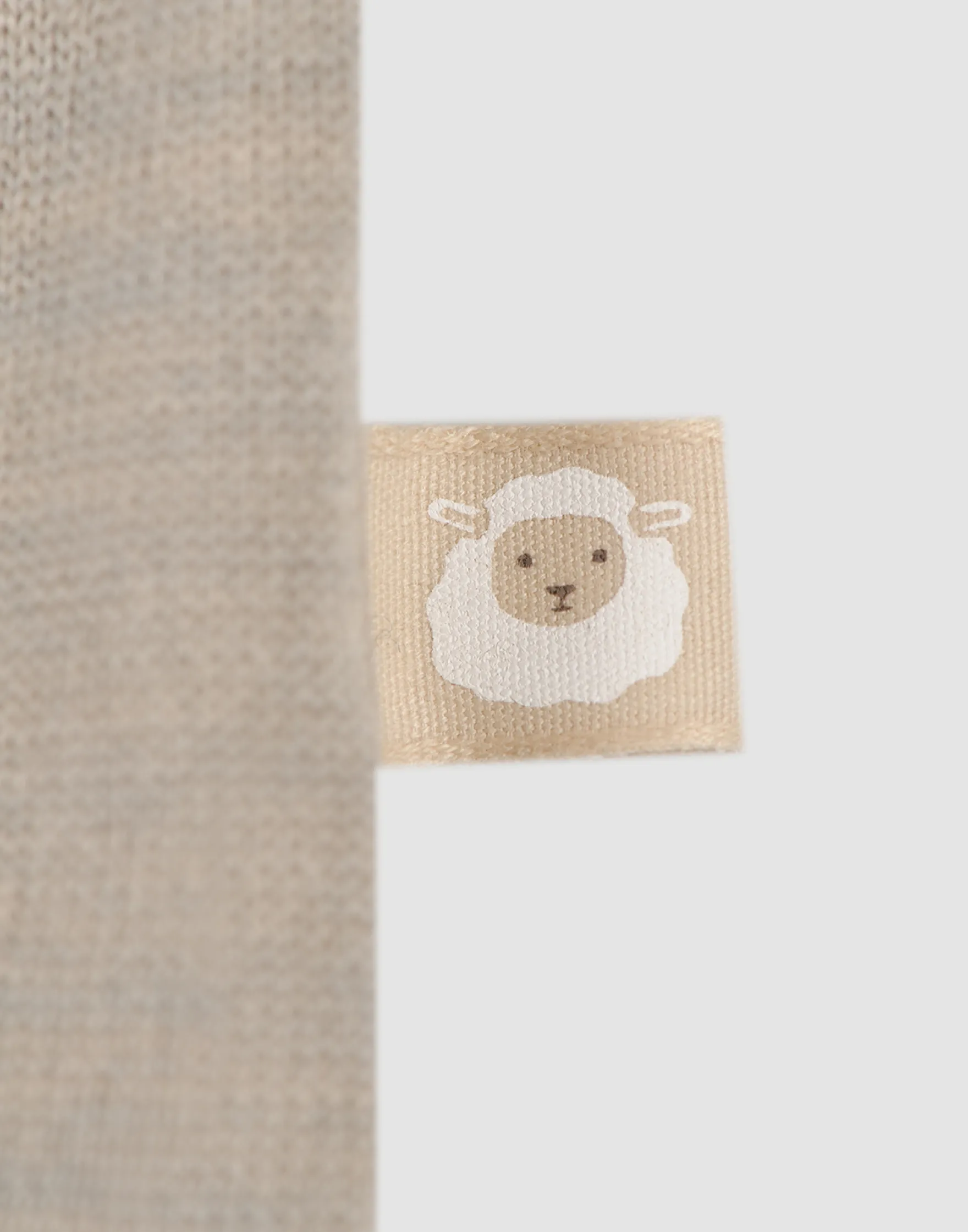 Heldragt i merinouldfrotté til baby