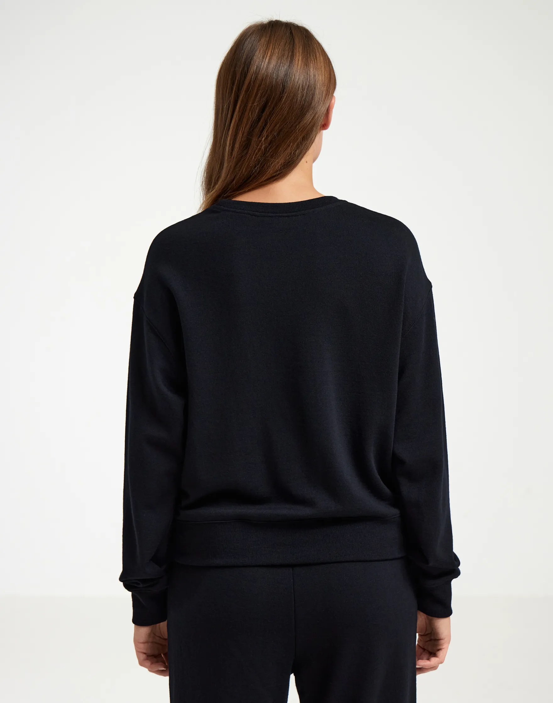 Kort sweatshirt i merinould til kvinder