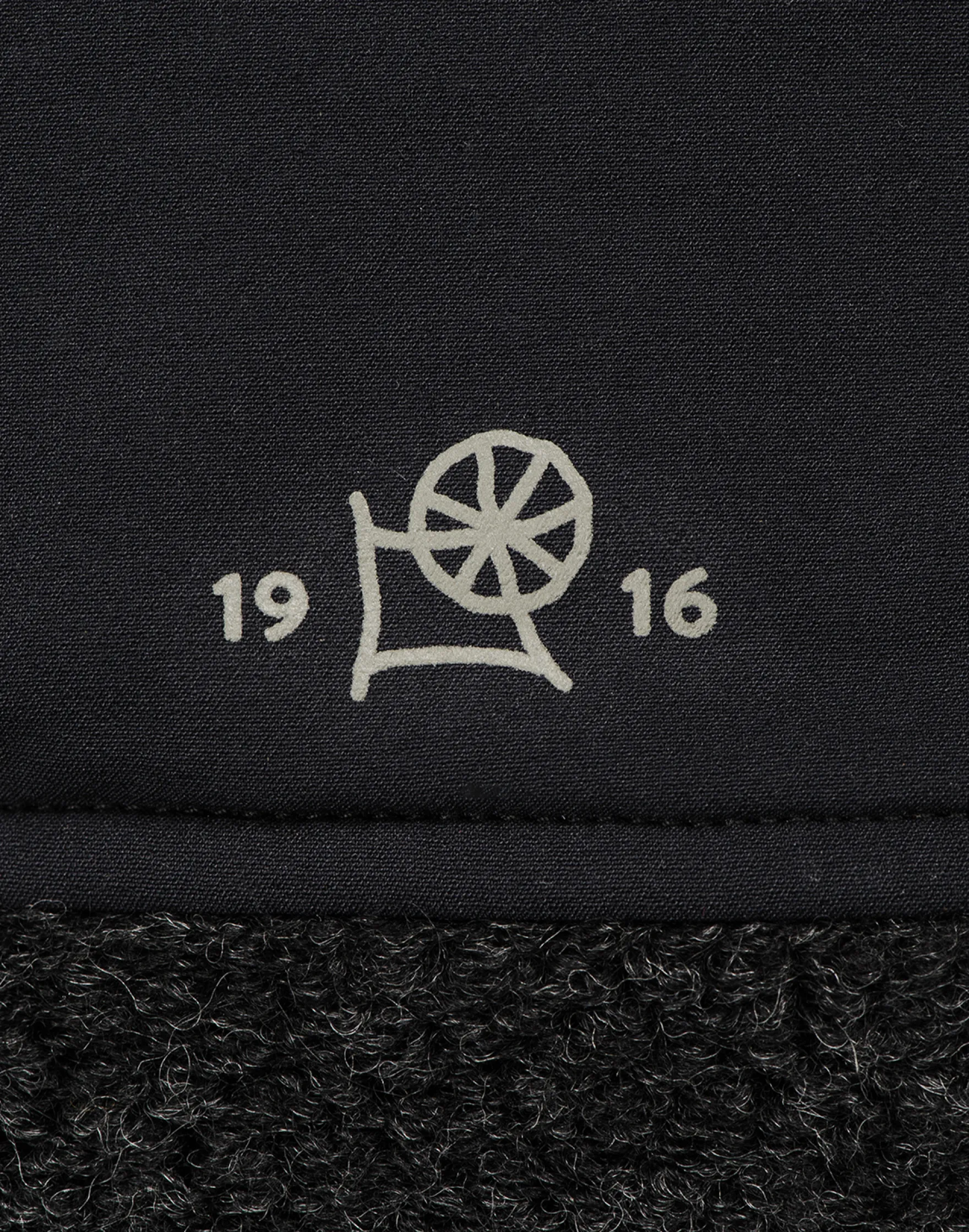 Vest i softshell/uldteddy til mænd